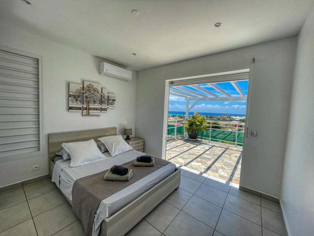 Location villa Topaze 2 chambres 4 personnes vue sur mer piscine à St François en Guadeloupe - chambre 2..
